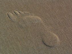 blurred footprint on the beach on the Baltic Sea