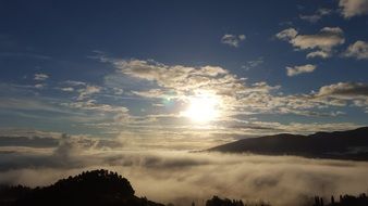 Beautiful and bright sunset among the clouds