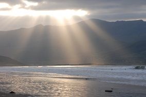 sunbeams of a beach sunset