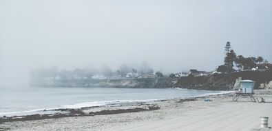 empty beach with lifeguard house
