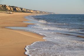 surf on the sandy beach in spain