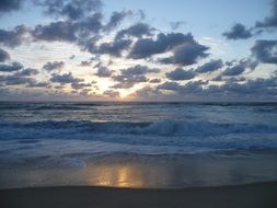 Sunset in the clouds over Atlantic