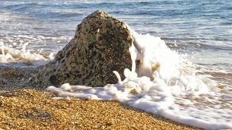 Waves on the rock on the beach