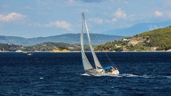 Yacht Sailing off the coast of greece