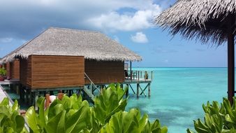 wooden villas over water in the Maldives