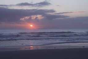 sunrise on the horizon over the ocean coast