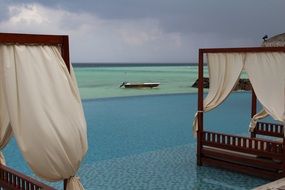 pergolas on the shore of the ocean in the Maldives