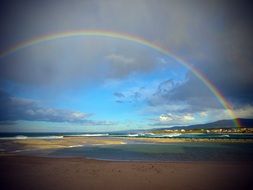 rainbow on the horizon over spain