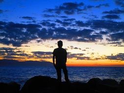 man at sunset on Puerto Vallarta beach