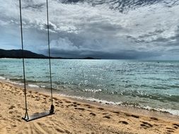 Swing on a beach