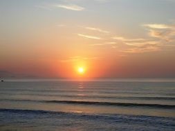 Landscape of Setting sun on a sky above the ocean
