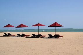 umbrellas on a sand Beach in Kuta