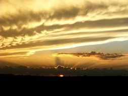 white fluffy clouds in the sky during sunset