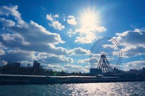 ferris wheel in city on waterside, Japan, Osaka