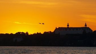 castle silhouette on a hill during sunset, Plon