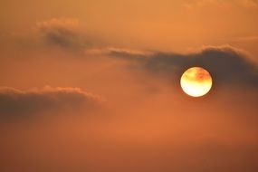 Orange backlight on a sky