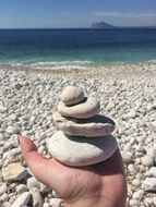 balance of white stones on hand