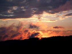 Sunset afterglow in the cloudy sky