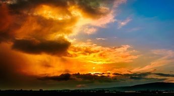 Beautiful sunset in the evening sky with the clouds