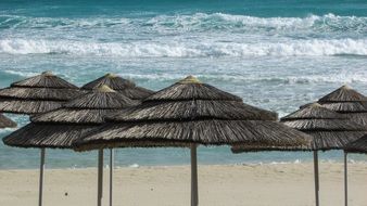 beach umbrellas on the beach in ayia napa