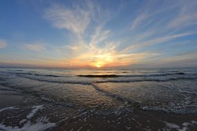 sunset over the boundless coast of the Baltic Sea