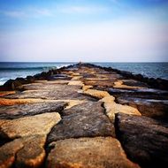 stone pier near the ocean