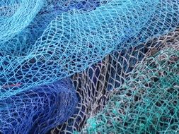blue fishing net in the ocean