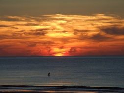 distant view of the sunset at sea