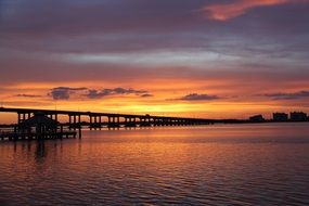 orange colorful sunset over florida coast