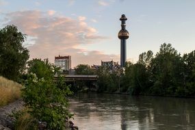 green trees on the banks near the canal in Vienna