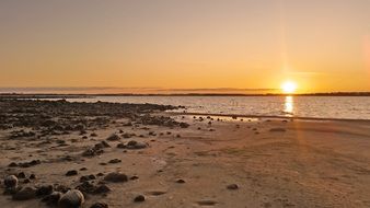 empty lake beach in the evening