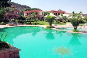 panoramic view of the pool at a luxury hotel in india