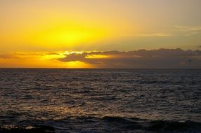 Beautiful and colorful sunset above the water in Tenerife