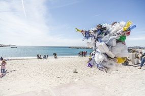 plastic trash on a sunny beach