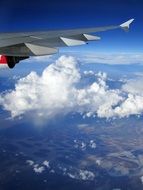 Aircraft Wing and Clouds