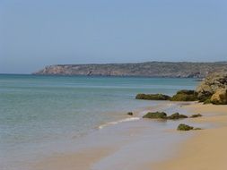 crystal clear water on a beach in portugal