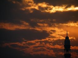 mosque in red clouds sunset