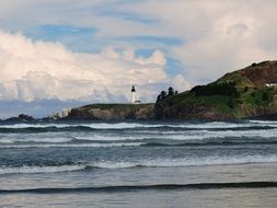 Yaquina Lighthouse and sea waves