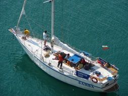 top view people on of sailing Yacht with Bulgarian flag on green Sea, Bulgaria