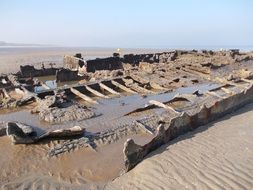 ship wreck in the sand