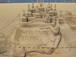sand castle as a sculpture on the beach