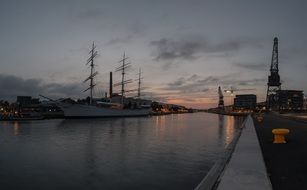 port on aura river at dusk