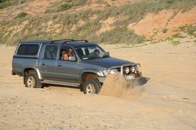 Picture of riding car on a sand