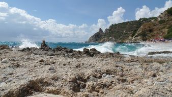 surf on the rocky coast in calabria