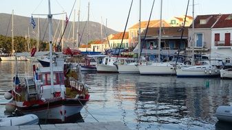 boats in harbor in greece