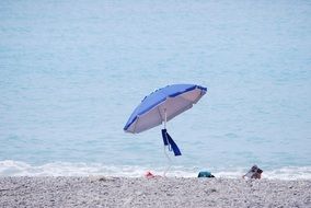 beach umbrella on the pebble beach