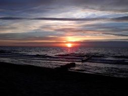 romantic sunset on the horizon above the sea