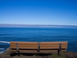 landscape of the wooden bench on the coast