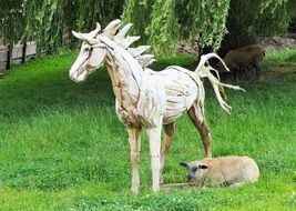 Wooden Horse and small sheep