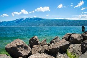Seascape with the rocks in Garda in Italy